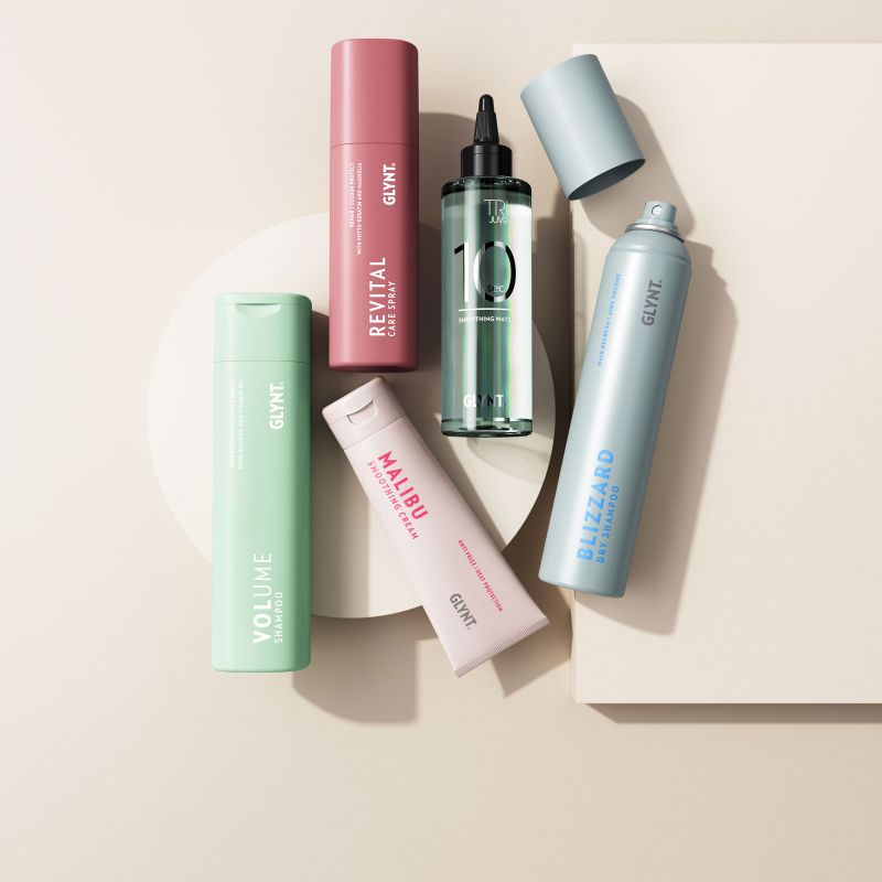 Werbefoto mit einigen Haarpflege- und Stylingprodukten von GLYNT®